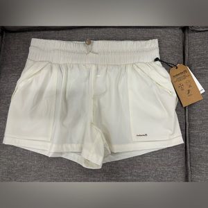 Sports/athletic shorts water resistant, helps with friction.